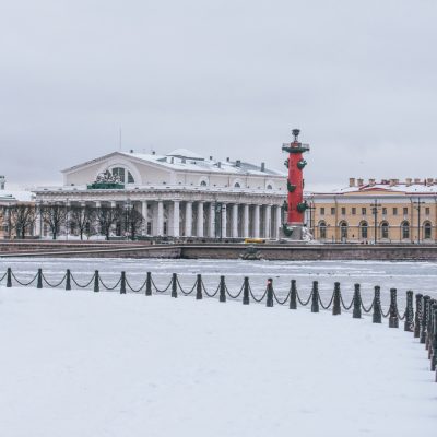 Arrows of Vasilievsky Island on a winter frosty day. Saint-Petersburg, Russia.