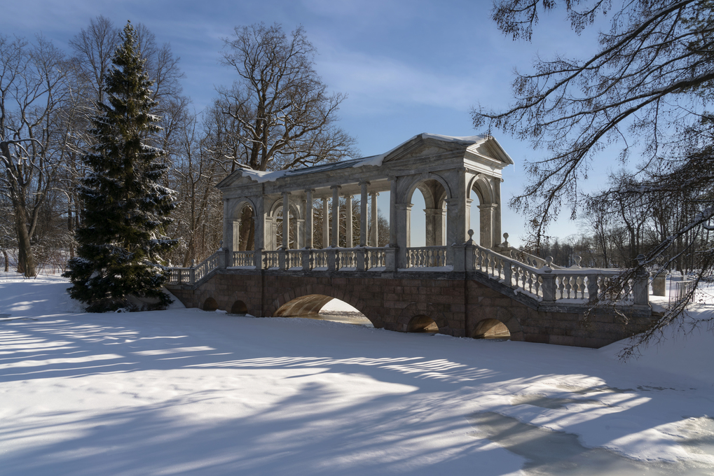 Marble bridge on the shore of a Large pond in the Catherine Park