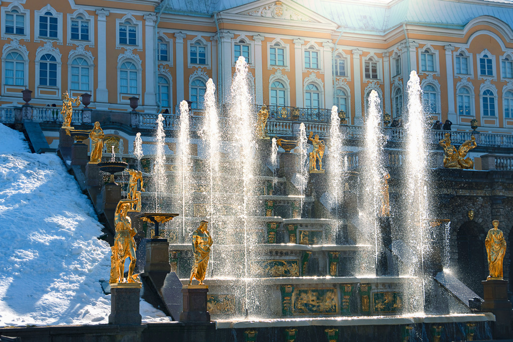 Test launch of fountains in the Peterhof palace and park complex. Snow and fountains