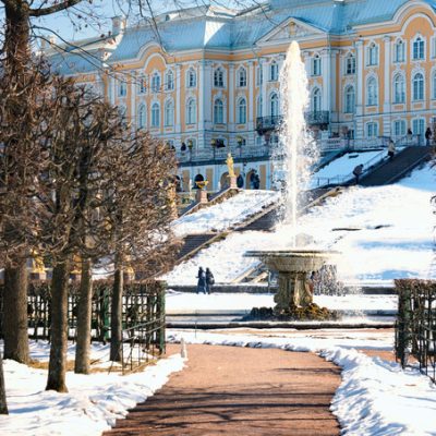 Test launch of fountains in the Peterhof palace and park complex. Snow and fountains