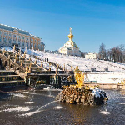 Test launch of fountains in the Peterhof palace and park complex. Snow and fountains