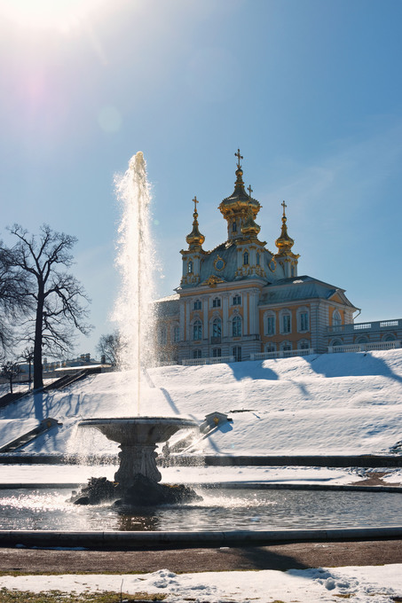 Test launch of fountains in the Peterhof palace and park complex. Snow and fountains