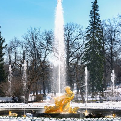 Test launch of fountains in the Peterhof palace and park complex. Snow and fountains