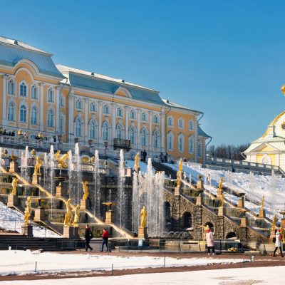 Test launch of fountains in the Peterhof palace and park complex. Snow and fountains