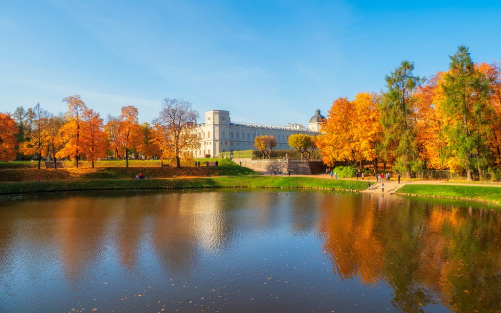 Bright autumn landscape with State Museum Reserve Gatchina. Sunn