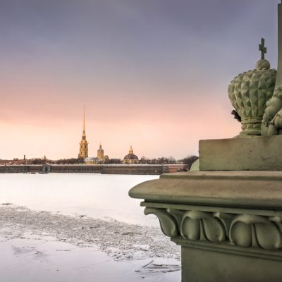 Peter and Paul Fortress in winter at sunset sky and part of Trin