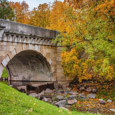 view-of-the-bridge-on-the-park-palace-on-an-autumn-day-gatchina-st-petersburg-russia