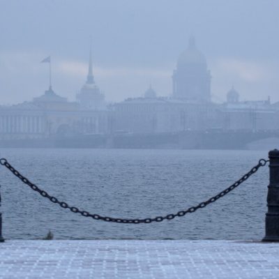 scenic-view-neva-river-against-buildings-foggy-weather